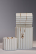 Set de pendientes y collar de corazón en oro rosado